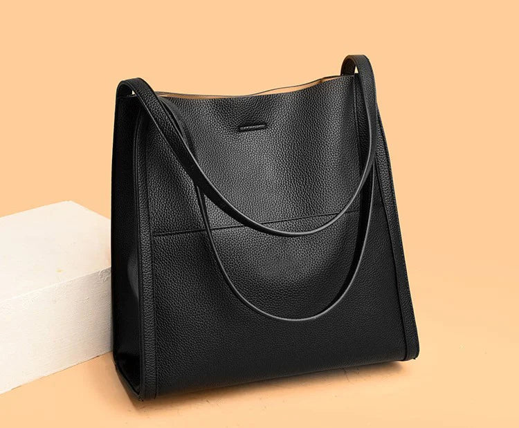 🔥👜👜【45% ZNIŻKI】Prosta, modna, pojemna torba na ramię z miękkiej skóry na jesień i zimę